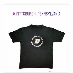 Demonstration black and gold t shirts